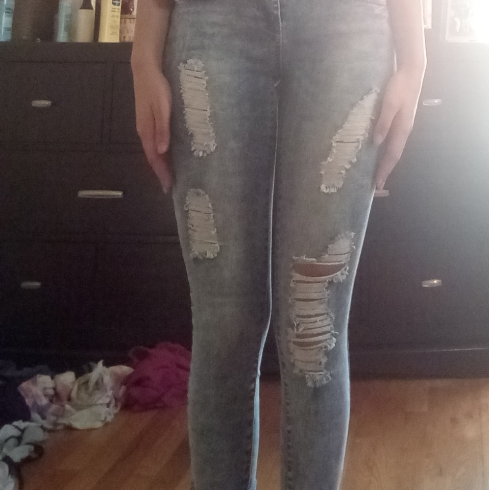 Acid wash distressed jeans